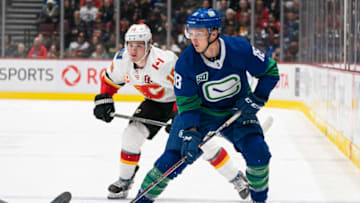 VANCOUVER, BC - FEBRUARY 08: Jake Virtanen #18 of the Vancouver Canucks skates with the puck in NHL action against the Calgary Flames at Rogers Arena on February 8, 2020 in Vancouver, Canada. (Photo by Rich Lam/Getty Images)