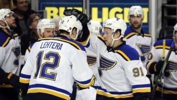 Apr 19, 2016; Chicago, IL, USA; St. Louis Blues right wing Vladimir Tarasenko (91) celebrates with center Jori Lehtera (12) after his goal against the Chicago Blackhawks during the first period in game four of the first round of the 2016 Stanley Cup Playoffs at United Center. Mandatory Credit: David Banks-USA TODAY Sports