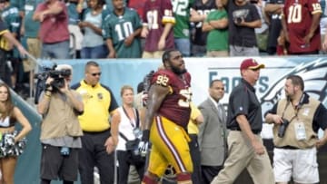 Sep 21, 2014; Philadelphia, PA, USA; Washington Redskins defensive end Chris Baker (92) walks off the field after being ejected during the fourth quarter against the Philadelphia Eagles at Lincoln Financial Field. The Eagles defeated the Redskins, 37-34. Mandatory Credit: Eric Hartline-USA TODAY Sports