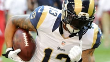 Dec 8, 2013; Phoenix, AZ, USA; St. Louis Rams wide receiver Chris Givens (13) warms up before the first quarter against the Arizona Cardinals at University of Phoenix Stadium. Arizona won 30-10. Mandatory Credit: Casey Sapio-USA TODAY Sports