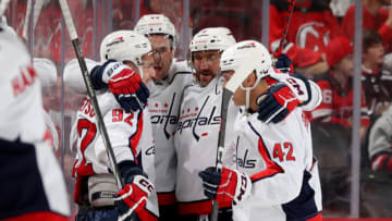 Evgeny Kuznetsov, Tom Wilson, Alex Ovechkin, Martin Fehervary, Washington Capitals (Photo by Elsa/Getty Images)