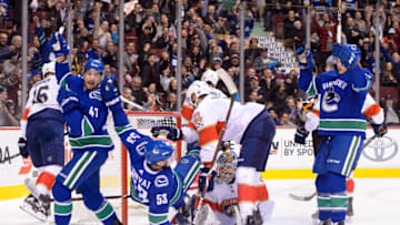 VANCOUVER, BC - FEBRUARY 14: Vancouver Canucks Center Bo Horvat (53) falls to the ice after scoring a goal during their NHL game against the Florida Panthers at Rogers Arena on February 14, 2018 in Vancouver, British Columbia, Canada. (Photo by Derek Cain/Icon Sportswire via Getty Images)
