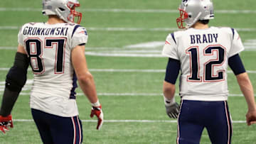 ATLANTA, GA - FEBRUARY 03: Rob Gronkowski #87 of the New England Patriots talks with Tom Brady #12 in the second half during Super Bowl LIII at Mercedes-Benz Stadium on February 3, 2019 in Atlanta, Georgia. (Photo by Mike Ehrmann/Getty Images)