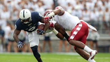 Sep 17, 2016; University Park, PA, USA; Penn State Nittany Lions running back Mark Allen (8) is stopped by Temple Owls defensive linesmen Haason Reddick (7) during the first quarter at Beaver Stadium. Mandatory Credit: Matthew O