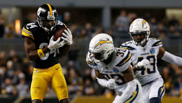 PITTSBURGH, PA - DECEMBER 02: Antonio Brown #84 of the Pittsburgh Steelers makes a catch as Derwin James #33 of the Los Angeles Chargers attempts a tackle in the first half during the game at Heinz Field on December 2, 2018 in Pittsburgh, Pennsylvania. (Photo by Justin K. Aller/Getty Images)