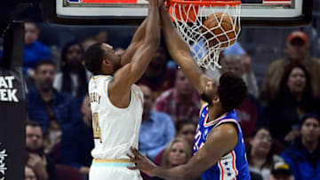 Nov 30, 2022; Cleveland, Ohio, USA; Cleveland Cavaliers forward Evan Mobley (4) dunks against Philadelphia 76ers center Joel Embiid (21) in the first quarter at Rocket Mortgage FieldHouse. Mandatory Credit: David Richard-USA TODAY Sports