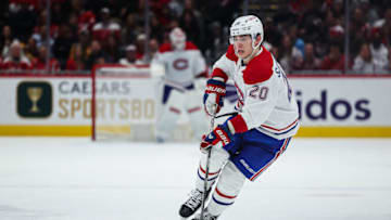 WASHINGTON, DC - DECEMBER 31: Juraj Slafkovsky #20 of the Montreal Canadiens skates with the puck against the Washington Capitals during the first period of the game at Capital One Arena on December 31, 2022 in Washington, DC. (Photo by Scott Taetsch/Getty Images)