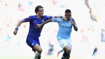LONDON, ENGLAND - AUGUST 05: Gabriel Jesus of Manchester City holds off David Luiz of Chelsea during the FA Community Shield between Manchester City and Chelsea at Wembley Stadium on August 5, 2018 in London, England. (Photo by Clive Mason/Getty Images)