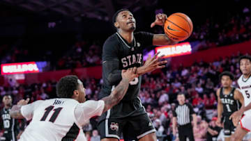 Jan 11, 2023; Athens, Georgia, USA; Mississippi State Bulldogs forward D.J. Jeffries (0) is fouled by Georgia Bulldogs guard Justin Hill (11) during the first half at Stegeman Coliseum. Mandatory Credit: Dale Zanine-USA TODAY Sports