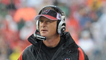 TAMPA, FL - NOVEMBER 30: Coach Jon Gruden of the Tampa Bay Buccaneers checks the scoreboard against the New Orleans Saints at Raymond James Stadium on November 30, 2008 in Tampa, Florida. (Photo by Al Messerschmidt/Getty Images)