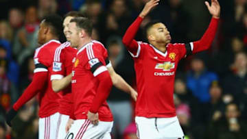 MANCHESTER, ENGLAND - FEBRUARY 02: Jesse Lingard (R) of Manchester United celebrates scoring his team's first goal during the Barclays Premier League match between Manchester United and Stoke City at Old Trafford on February 2, 2016 in Manchester, England. (Photo by Clive Mason/Getty Images)