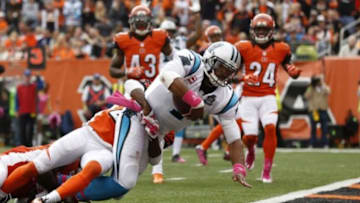 Oct 12, 2014; Cincinnati, OH, USA; Carolina Panthers quarterback Cam Newton (1) scores a touchdown during the second half against the Cincinnati Bengals at Paul Brown Stadium. The Bengals and the Panthers tie in overtime 37-37. Mandatory Credit: Aaron Doster-USA TODAY Sports