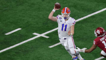 ARLINGTON, TEXAS - DECEMBER 30: Quarterback Kyle Trask #11 of the Florida Gators throws against the Oklahoma Sooners during the second quarter at AT&T Stadium on December 30, 2020 in Arlington, Texas. (Photo by Carmen Mandato/Getty Images)