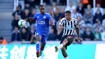 NEWCASTLE UPON TYNE, ENGLAND - SEPTEMBER 29: Kenedy of Newcastle United and Ricardo Pereira of Leicester City competes for the ball during the Premier League match between Newcastle United and Leicester City at St. James Park on September 29, 2018 in Newcastle upon Tyne, United Kingdom. (Photo by Mark Runnacles/Getty Images)