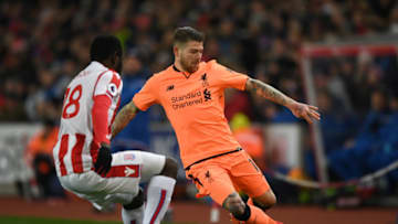 STOKE ON TRENT, ENGLAND - NOVEMBER 29: Alberto Moreno of Liverpool is put under pressure by Mame Biram Diouf of Stoke City during the Premier League match between Stoke City and Liverpool at Bet365 Stadium on November 29, 2017 in Stoke on Trent, England. (Photo by Gareth Copley/Getty Images)
