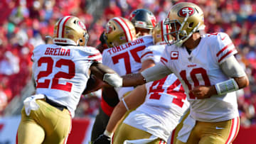 TAMPA, FLORIDA - SEPTEMBER 08: Jimmy Garoppolo #10 of the San Francisco 49ers hands the ball off to Matt Breida #22 in the second quarter of a football game against the Tampa Bay Buccaneers at Raymond James Stadium on September 08, 2019 in Tampa, Florida. (Photo by Julio Aguilar/Getty Images)