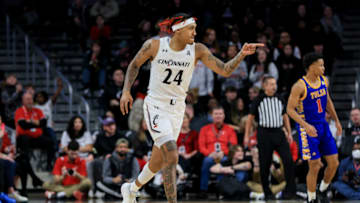 Cincinnati Bearcats guard Jeremiah Davenport against Tulsa Golden Hurricane at Fifth Third Arena. USA Today.