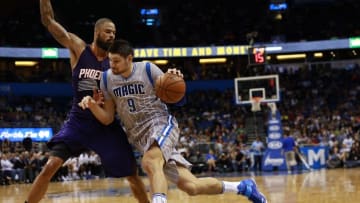 Mar 4, 2016; Orlando, FL, USA; Orlando Magic center Nikola Vucevic (9) drives to the basket as Phoenix Suns center Tyson Chandler (4) defends during the second half at Amway Center. Mandatory Credit: Kim Klement-USA TODAY Sports