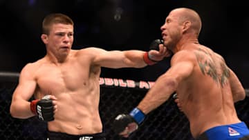LAS VEGAS, NV - AUGUST 20: (L-R) Rick Story punches Donald Cerrone in their welterweight bout during the UFC 202 event at T-Mobile Arena on August 20, 2016 in Las Vegas, Nevada. (Photo by Jeff Bottari/Zuffa LLC/Zuffa LLC via Getty Images)