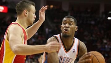 Feb 20, 2013; Houston, TX, USA; Oklahoma City Thunder small forward Perry Jones (3) drives the ball during the second quarter against the Houston Rockets at Toyota Center. Mandatory Credit: Troy Taormina-USA TODAY Sports