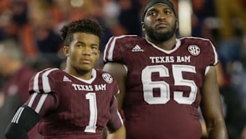 COLLEGE STATION, TX - NOVEMBER 07: Kyler Murray #1 of the Texas A&M Aggies and Avery Gennesy #65 during pre-game ceremony at Kyle Field on November 7, 2015 in College Station, Texas. (Photo by Bob Levey/Getty Images)