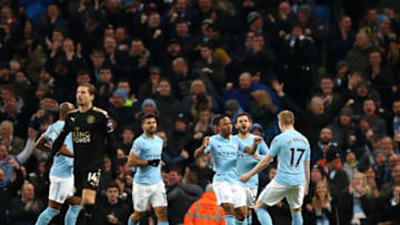 MANCHESTER, ENGLAND - FEBRUARY 10: Raheem Sterling of Manchester City celebrates scoring his side's first goal with team mates during the Premier League match between Manchester City and Leicester City at Etihad Stadium on February 10, 2018 in Manchester, England. (Photo by Clive Brunskill/Getty Images)