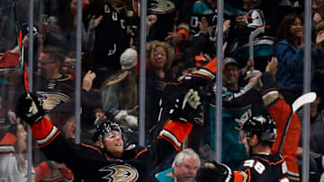 ANAHEIM, CA - OCTOBER 3: Cam Fowler #4 of the Anaheim Ducks celebrates his second period goal with Derek Grant #38 during the game against the Arizona Coyotes at Honda Center on October 3, 2019 in Anaheim, California. (Photo by Debora Robinson/NHLI via Getty Images)