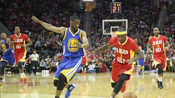 Dec 31, 2015; Houston, TX, USA; Houston Rockets guard Ty Lawson (3) dribbles against Golden State Warriors guard Ian Clark (21) in the second quarter at Toyota Center. Mandatory Credit: Thomas B. Shea-USA TODAY Sports