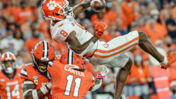 Clemson wide receiver Justyn Ross (8) catches a pass for a first down during the second quarter at the Carrier Dome in Syracuse, New York, Friday, October 15, 2021.Ncaa Football Clemson At Syracuse