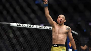 Dec 14, 2019; Las Vegas, NV, USA; (Editors Notes: Caption Correction) Jose Aldo (blue gloves) reacts after his bout against Marlon Moraes (not pictured) during UFC 245 at T-Mobile Arena. Mandatory Credit: Stephen R. Sylvanie-USA TODAY Sports