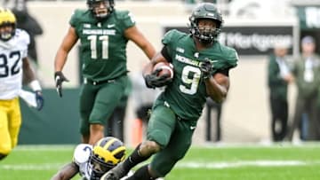 Michigan State's Kenneth Walker III runs for a touchdown against Michigan during the fourth quarter on Saturday, Oct. 30, 2021, at Spartan Stadium in East Lansing.211030 Msu Michigan 317a