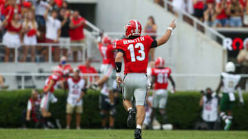 Stetson Bennett celebrates after a touchdown throw against UAB. (Photo by Brett Davis/Getty Images)