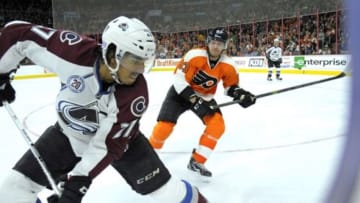 Nov 10, 2015; Philadelphia, PA, USA; Colorado Avalanche center Andreas Martinsen (27) handles the puck along the boards against Philadelphia Flyers right wing Jakub Voracek (93) during the second period at Wells Fargo Center. Mandatory Credit: Eric Hartline-USA TODAY Sports