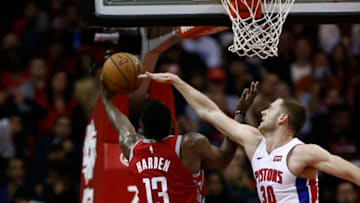 HOUSTON, TEXAS - NOVEMBER 21: James Harden #13 of the Houston Rockets drives past Jon Leuer #30 of the Detroit Pistons for a layup during the third quarter at Toyota Center on November 21, 2018 in Houston, Texas. NOTE TO USER: User expressly acknowledges and agrees that, by downloading and or using this photograph, User is consenting to the terms and conditions of the Getty Images License Agreement. (Photo by Bob Levey/Getty Images)