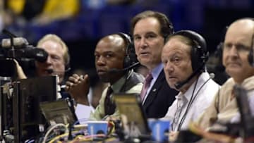 Mar 21, 2014; St. Louis, MO, USA; TV announcers Jim Nantz (right) and Greg Anthony (right) call the game between the Stanford Cardinal and the New Mexico Lobos in the first half during the 2nd round of the 2014 NCAA Men