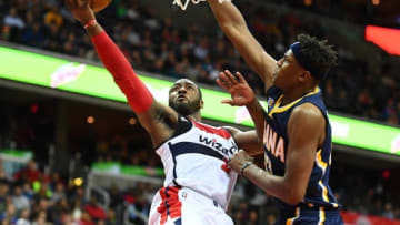 Dec 28, 2016; Washington, DC, USA; Washington Wizards guard John Wall (2) shoots as Indiana Pacers center Myles Turner (33) defends during the second half at Verizon Center. The Wizards won 111 - 105. Mandatory Credit: Brad Mills-USA TODAY Sports