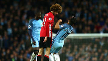 MANCHESTER, ENGLAND - APRIL 27: Marouane Fellaini of Manchester United clashes heads with Sergio Aguero of Manchester City during the Premier League match between Manchester City and Manchester United at Etihad Stadium on April 27, 2017 in Manchester, England. (Photo by Robbie Jay Barratt - AMA/Getty Images)