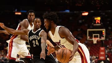 Oct 11, 2016; Miami, FL, USA; Miami Heat forward Justise Winslow (20) drives to the basket past Brooklyn Nets guard Rondae Hollis-Jefferson (24) during the second half at American Airlines Arena. Mandatory Credit: Steve Mitchell-USA TODAY Sports
