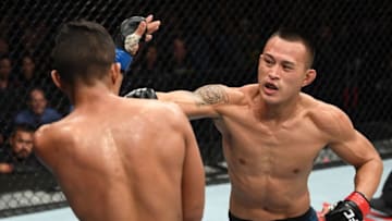MONCTON, NB - OCTOBER 27: (R-L) Andre Soukhamthath punches Jonathan Martinez in their bantamweight bout during the UFC Fight Night event inside Avenir Centre on October 27, 2018 in Moncton, New Brunswick, Canada. (Photo by Jeff Bottari/Zuffa LLC/Zuffa LLC via Getty Images)