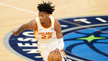 MINNEAPOLIS, MINNESOTA - JANUARY 22: Cam Reddish #22 of the Atlanta Hawks dribbles the ball against the Minnesota Timberwolves =dg at Target Center on January 22, 2021 in Minneapolis, Minnesota. The Hawks defeated the Timberwolves 116-98. NOTE TO USER: User expressly acknowledges and agrees that, by downloading and or using this Photograph, user is consenting to the terms and conditions of the Getty Images License Agreement (Photo by Hannah Foslien/Getty Images)