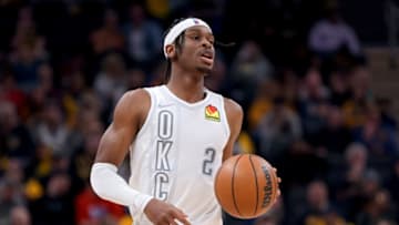 Shai Gilgeous-Alexander #2 of the Oklahoma City Thunder dribbles the ball in the second quarter against the Indiana Pacers at Gainbridge Fieldhouse on February 25, 2022 in Indianapolis, Indiana. (Photo by Dylan Buell/Getty Images)