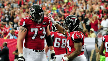 Atlanta Falcons Devonta Freeman Ryan Schraeder (Photo by Scott Cunningham/Getty Images)