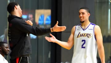 LOS ANGELES, CA - MAY 29: Agent Harrison Gaines looks on as Lonzo Ball #1 of the Los Angeles Lakers greets his brother LiAngelo Ball #2 after he completed his NBA Pre-Draft Workout with the Los Angeles Lakers on May 29, 2018 in Los Angeles, California. NOTE TO USER: User expressly acknowledges and agrees that, by downloading and or using this photograph, User is consenting to the terms and conditions of the Getty Images License Agreement (Photo by Jayne Kamin-Oncea/Getty Images)