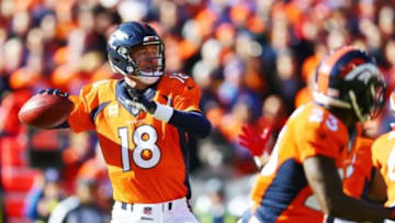 Jan 24, 2016; Denver, CO, USA; Denver Broncos quarterback Peyton Manning (18) drops back to pass against the New England Patriots in the first quarter in the AFC Championship football game at Sports Authority Field at Mile High. Mandatory Credit: Mark J. Rebilas-USA TODAY Sports