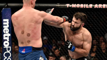 LAS VEGAS, NV - MARCH 03: (R-L) Andrei Arlovski of Belarus punches Stefan Struve of The Netherlands in their heavyweight bout during the UFC 222 event inside T-Mobile Arena on March 3, 2018 in Las Vegas, Nevada. (Photo by Jeff Bottari/Zuffa LLC/Zuffa LLC via Getty Images)
