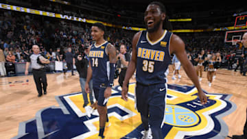DENVER, CO - NOVEMBER 24: Gary Harris #14 and Kenneth Faried #35 of the Denver Nuggets after the game against the Memphis Grizzlies on November 24, 2017 at the Pepsi Center in Denver, Colorado. NOTE TO USER: User expressly acknowledges and agrees that, by downloading and/or using this photograph, user is consenting to the terms and conditions of the Getty Images License Agreement. Mandatory Copyright Notice: Copyright 2017 NBAE (Photo by Garrett Ellwood/NBAE via Getty Images)