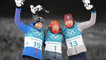 PYEONGCHANG-GUN, SOUTH KOREA - FEBRUARY 12: Anastasiya Kuzmina of Slovakia wins the silver medal, Laura Dahlmeier of Germany wins the gold medal, Anais Bescond of France wins the bronze medal during the Biathlon Men's and Women's Pursuit at Alpensia Biathlon Centre on February 12, 2018 in Pyeongchang-gun, South Korea. (Photo by Christophe Pallot/Agence Zoom/Getty Images)
