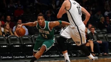 Oct 14, 2015; Brooklyn, NY, USA; Boston Celtics guard Evan Turner (11) drives to the basket against Brooklyn Nets guard Sergey Karasev (10)during second half at Barclays Center. Mandatory Credit: Noah K. Murray-USA TODAY Sports