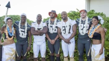 January 29, 2016; Kahuku, HI, USA; Hawaiian hostesses Chelsea Hardin (far left) and Mahina Garcia (far right) pose with Team Irvin quarterback Teddy Bridgewater of the Minnesota Vikings (5), Team Rice running back Adrian Peterson of the Minnesota Vikings (28), Team Irvin linebacker Anthony Barr of the Minnesota Vikings (55), Team Rice defensive end Everson Griffen of the Minnesota Vikings (97), and Team Irvin free safety Harrison Smith of the Minnesota Vikings (22) during 2016 Pro Bowl photo day at Turtle Bay Resort. Mandatory Credit: Kyle Terada-USA TODAY Sports
