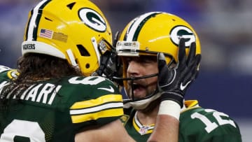 ARLINGTON, TX - JANUARY 15: David Bakhtiari #69 and Aaron Rodgers #12 of the Green Bay Packers celebrate after scoring a touchdown in the first half during the NFC Divisional Playoff Game against the Dallas Cowboys at AT&T Stadium on January 15, 2017 in Arlington, Texas. (Photo by Ezra Shaw/Getty Images)